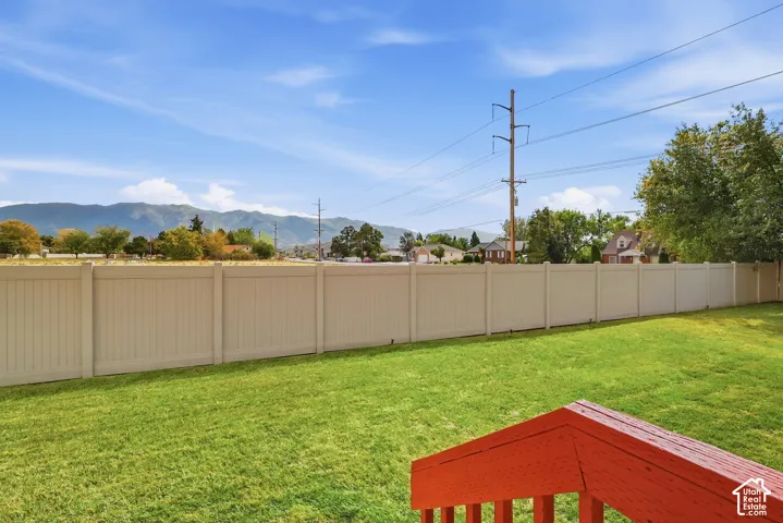 Backyard with vinyl fencing.