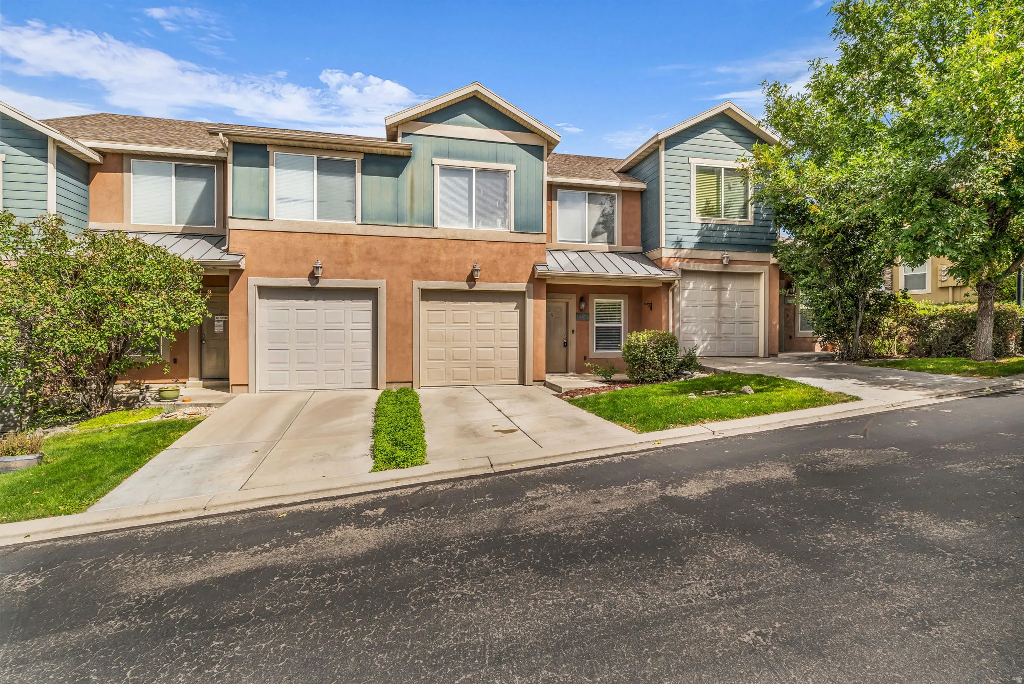 Multi-story exterior with stucco and siding finishes