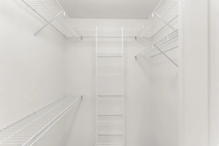 White wire shelving system providing ample storage