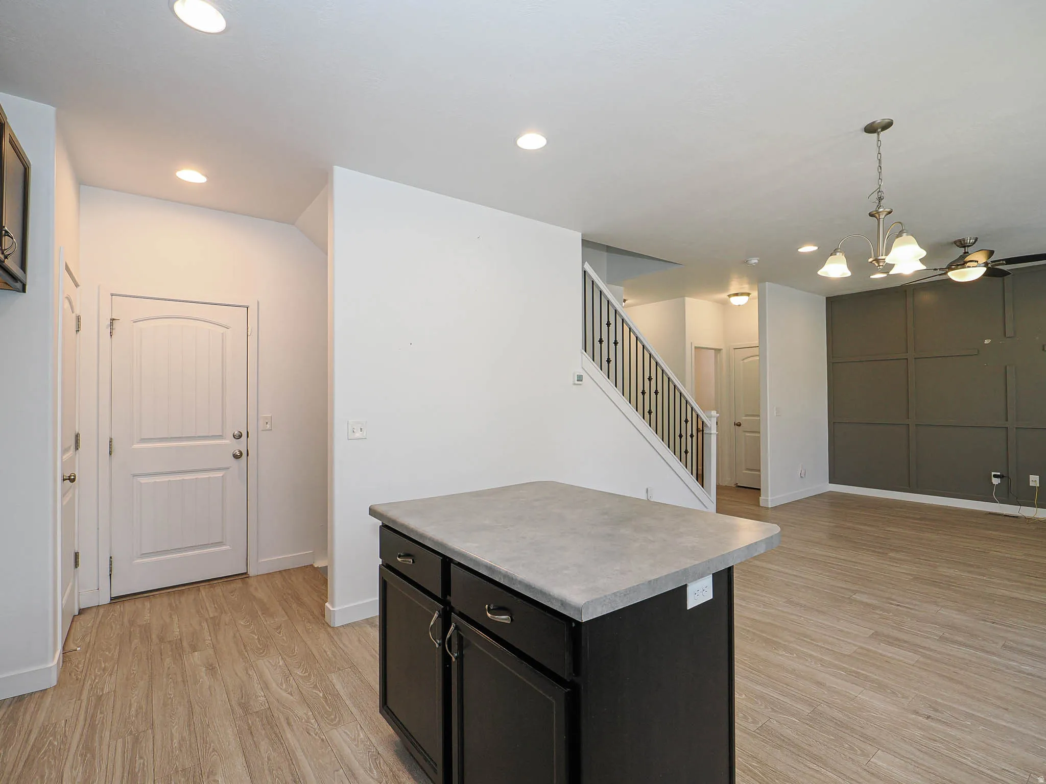 Kitchen island with cabinetry and countertop