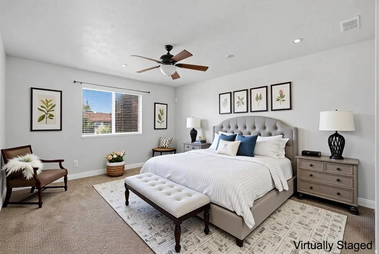 Carpeted flooring, window with horizontal blinds, recessed lighting, and a ceiling fan with integrated lighting