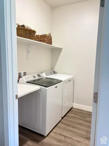 Built-in shelving, wood-finish flooring, and a white countertop