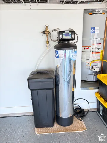 Water softener system with an accompanying water heater