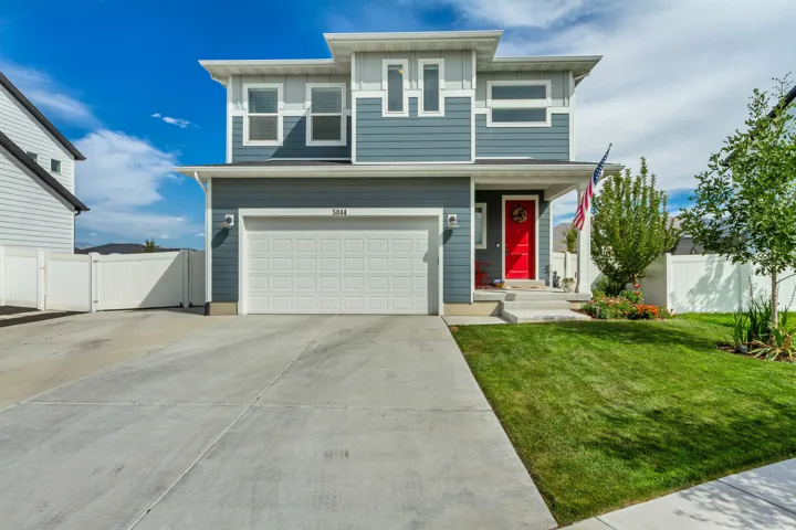 Contemporary two-story exterior with a two-car garage