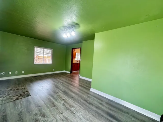 Wood-finish flooring with white trim