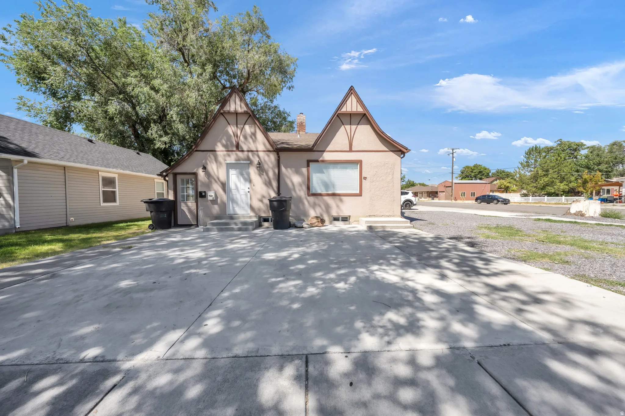 Tudor Revival architecture with prominent gables and timber detailing