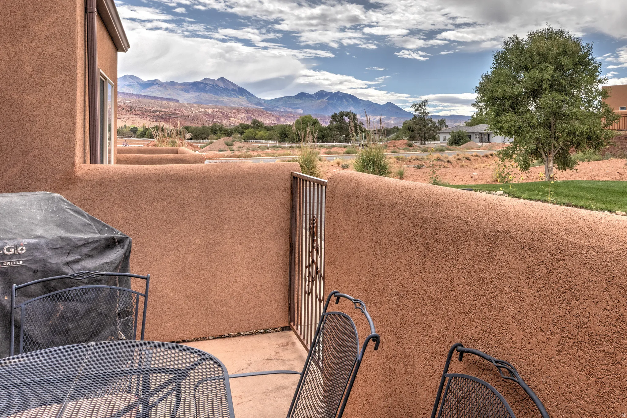 Patio with textured stucco walls and mountain backdrop