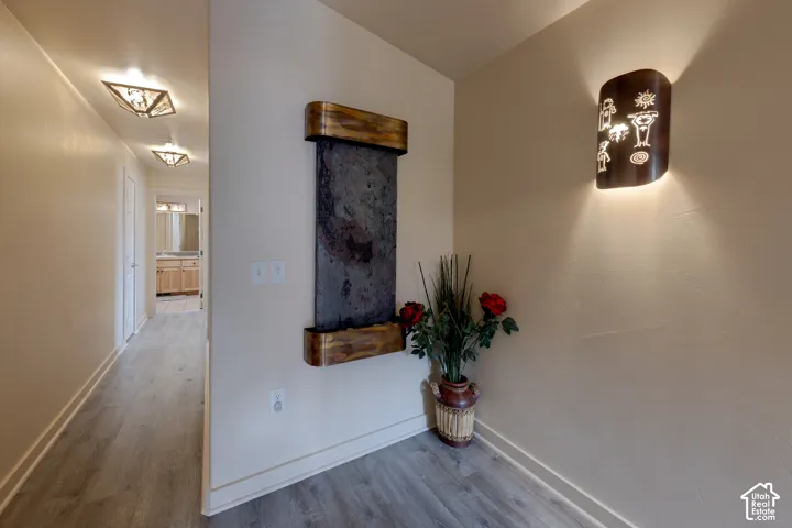 Wall-mounted water feature with a stone facade