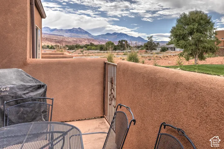 Patio with textured stucco walls and mountain backdrop