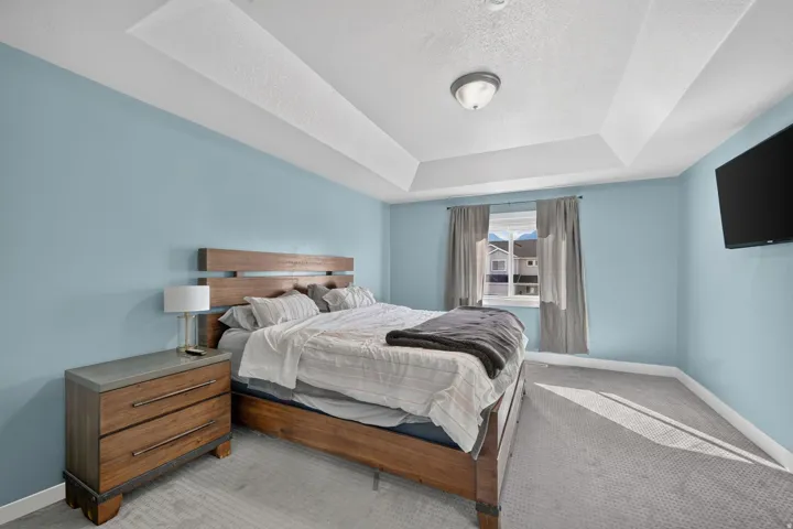 Tray ceiling with a central flush mount light fixture