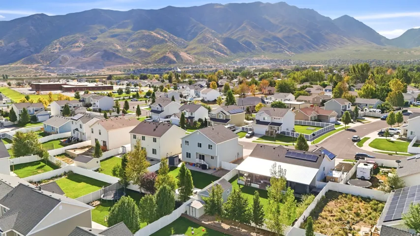 Neighborhood setting with mountain backdrop and established residential properties