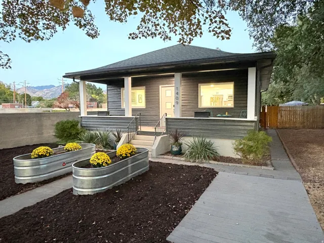 Covered porch with white support columns