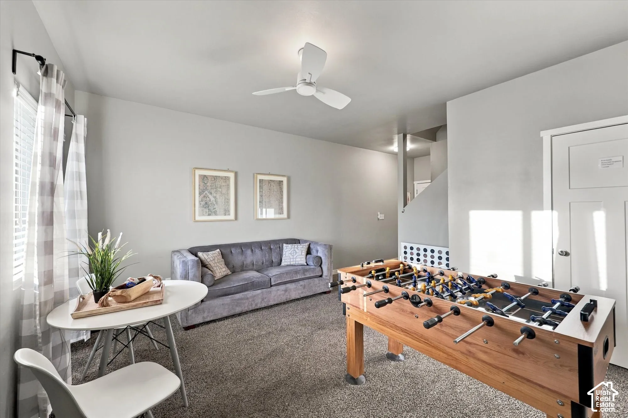 Recessed lighting, ceiling fan, and carpet flooring