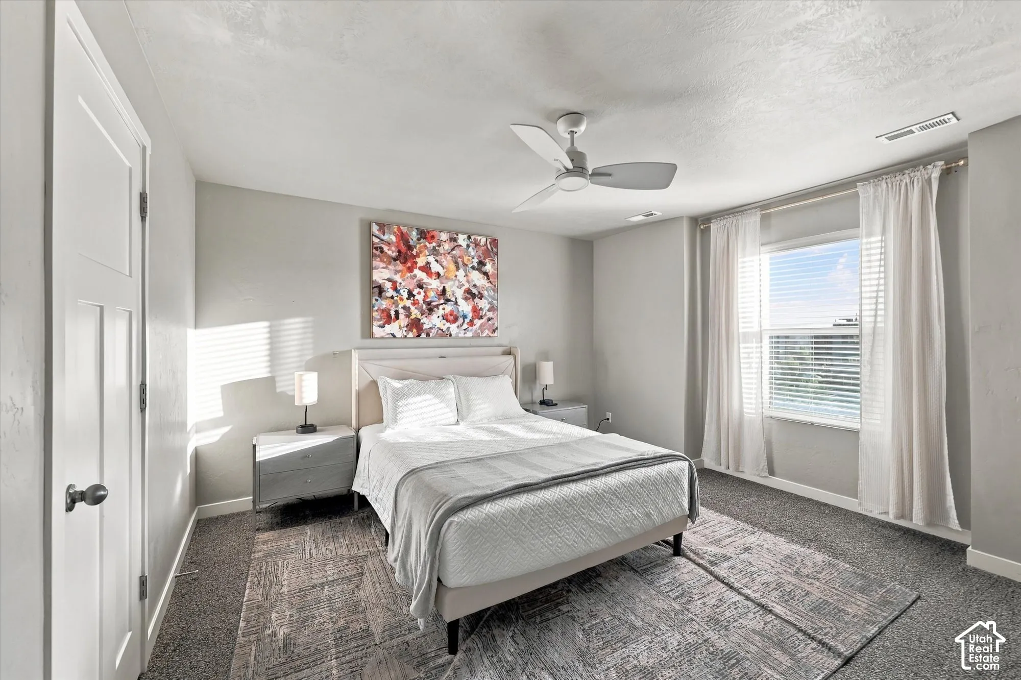 Recessed lighting, ceiling fan, window with blinds, panel door, and wall-to-wall carpeting
