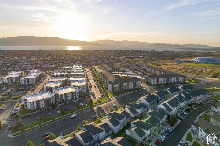 Expansive community with multi-story residential buildings and townhomes