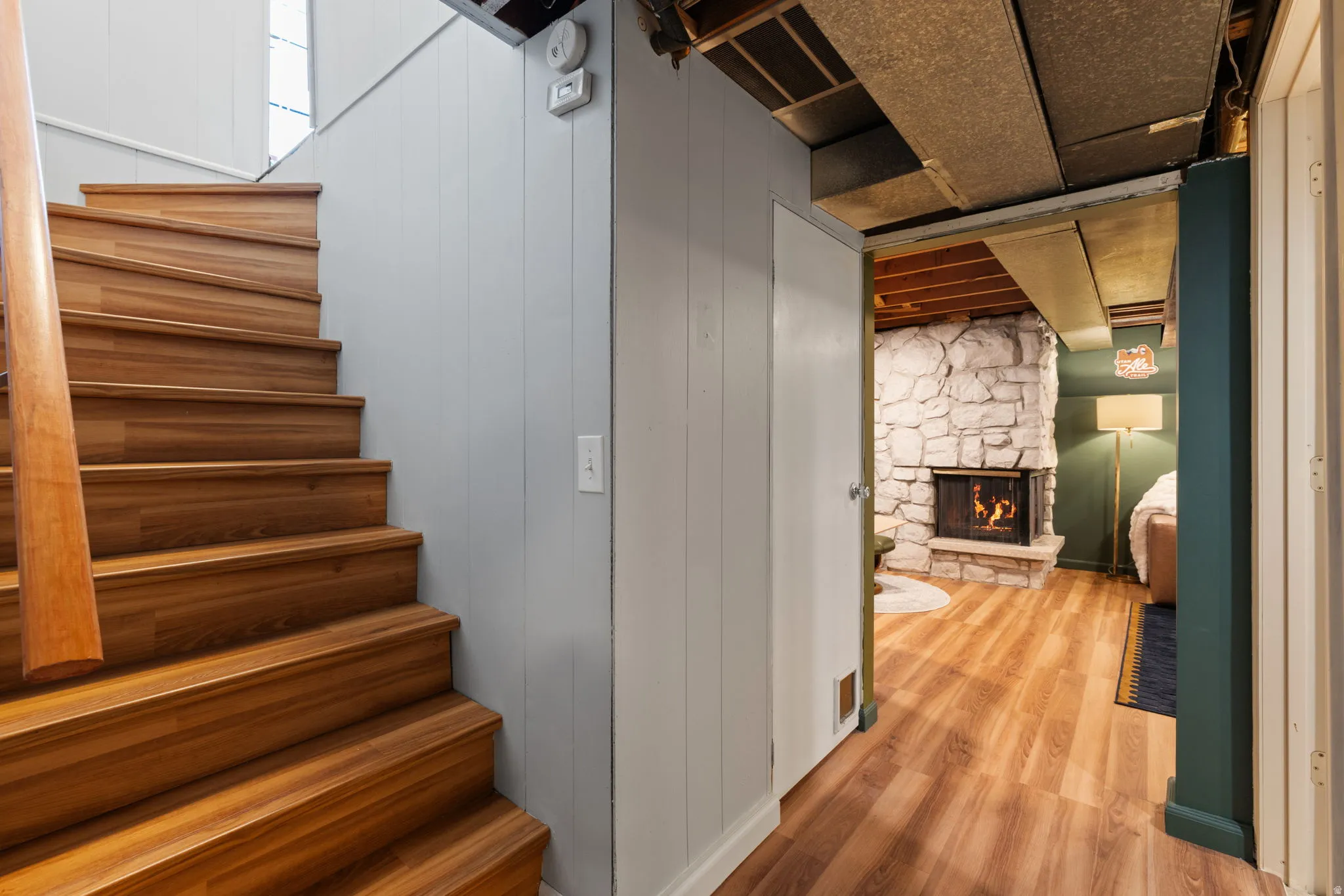 Wood-finish staircase with matching handrail