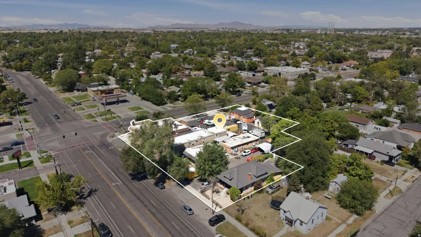 Aerial perspective showcasing a corner lot property