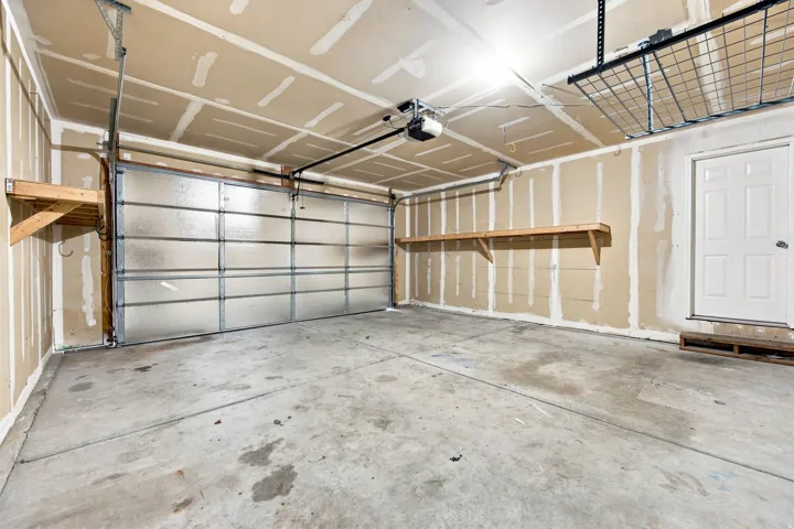 Concrete flooring and unpainted walls