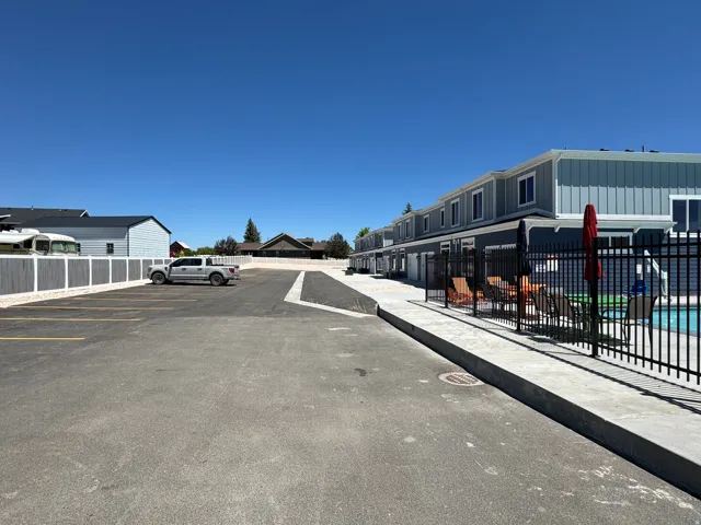Multi-level exterior with light blue siding