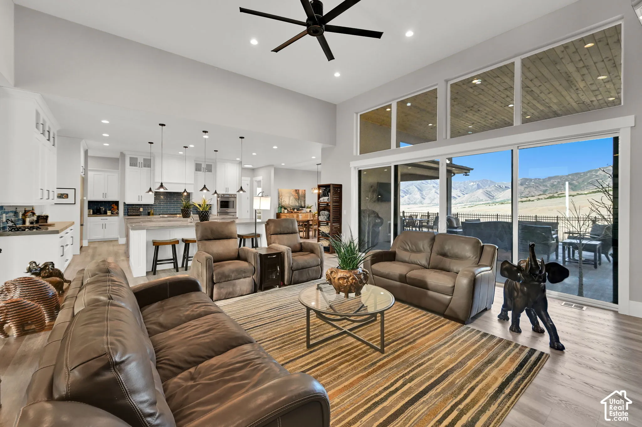 Open-concept living space with wood-finish flooring