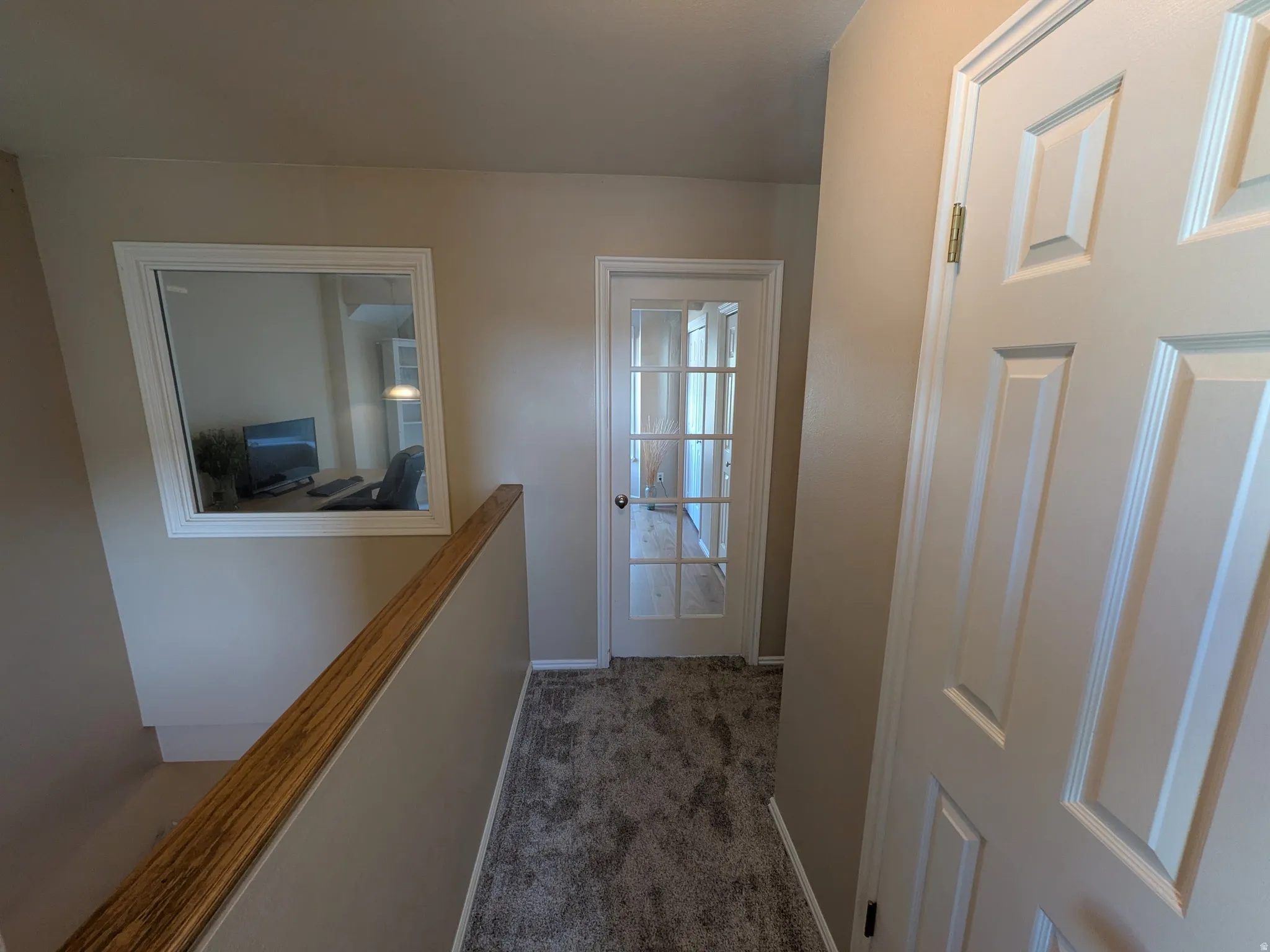 View to office/bedroom with window and French door for superior natural lighting