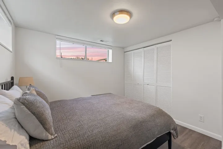 White walls with a flush-mount ceiling light