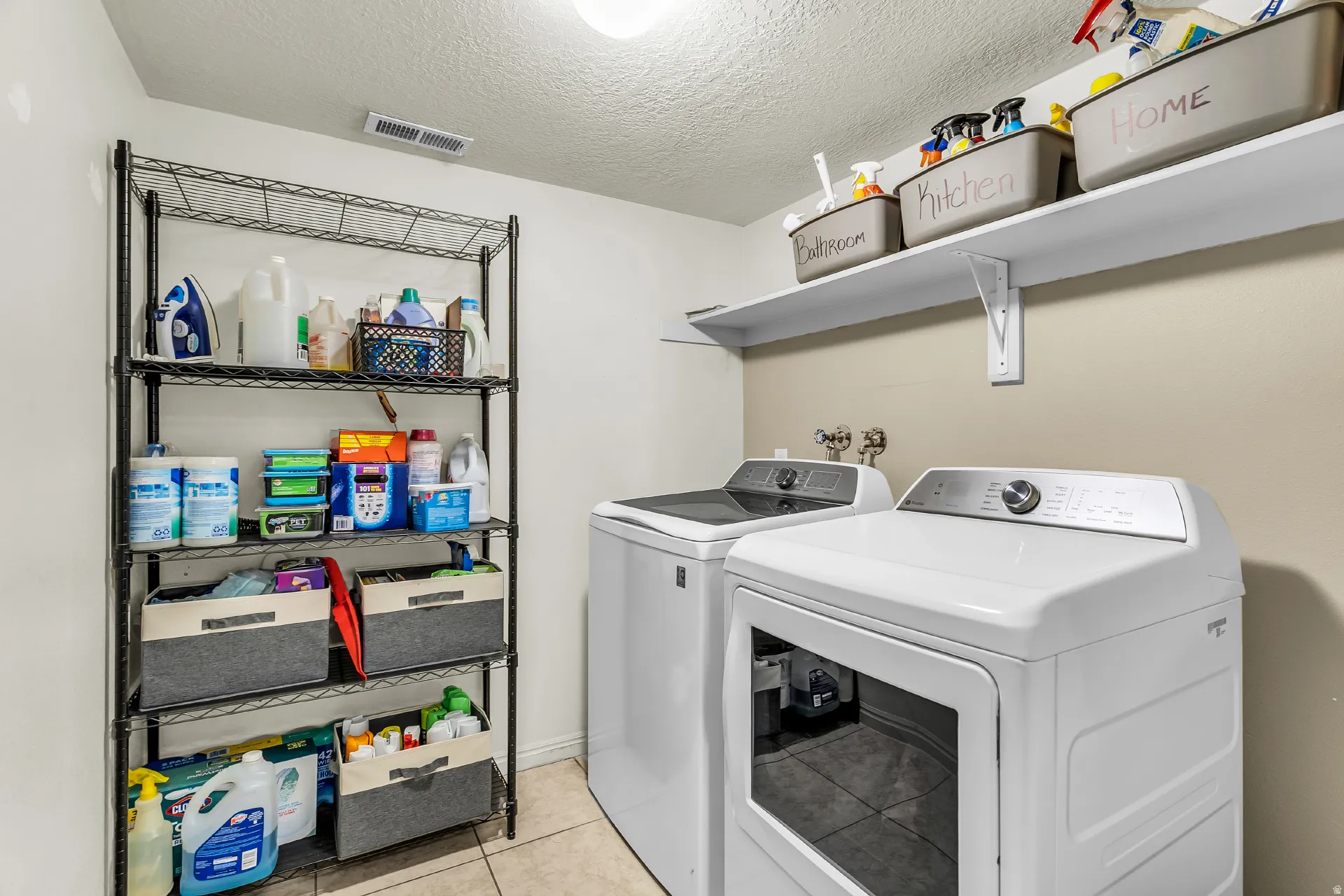 Spacious main level laundry room.