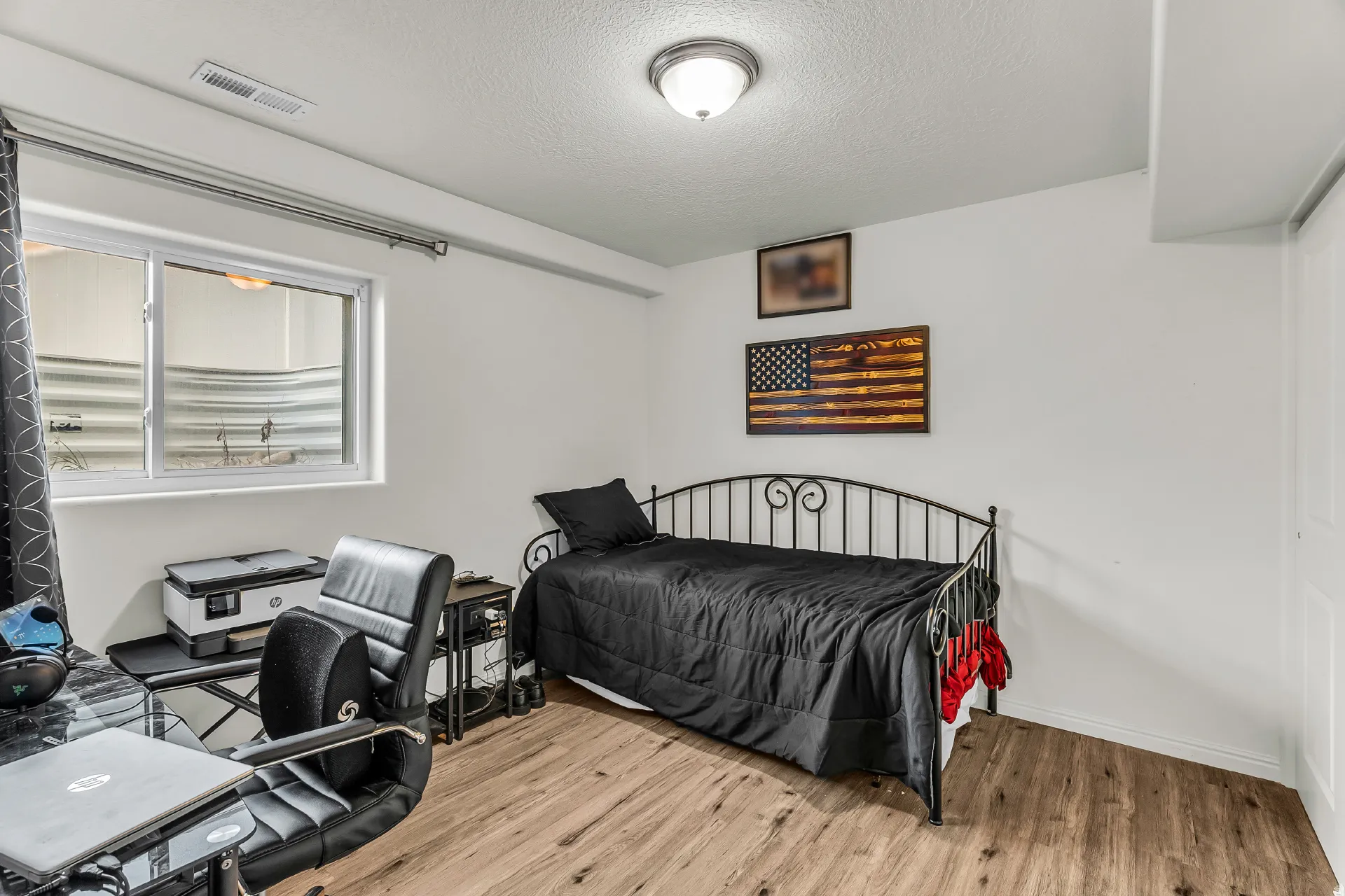 Professionally finished basement with bedroom.