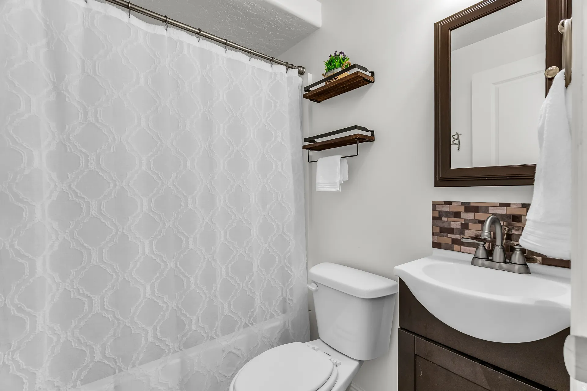 Professionally finished basement with full bathroom.