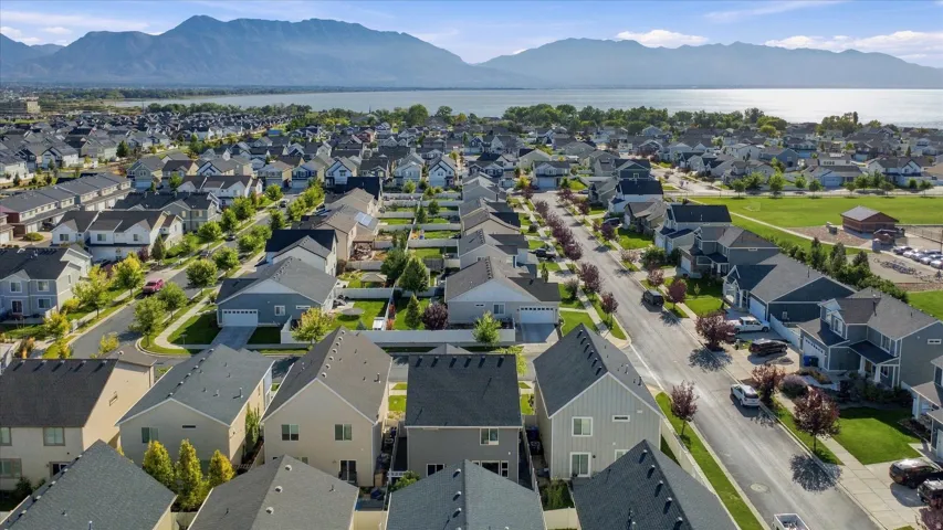 Residential neighborhood with a mountain and lake backdrop