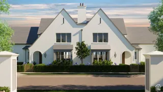 Stucco exterior with gabled roof lines, multiple arched entryways, bay windows, and manicured landscaping