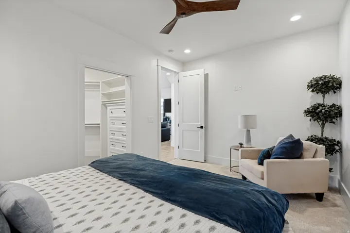 Recessed lighting and ceiling fan overhead