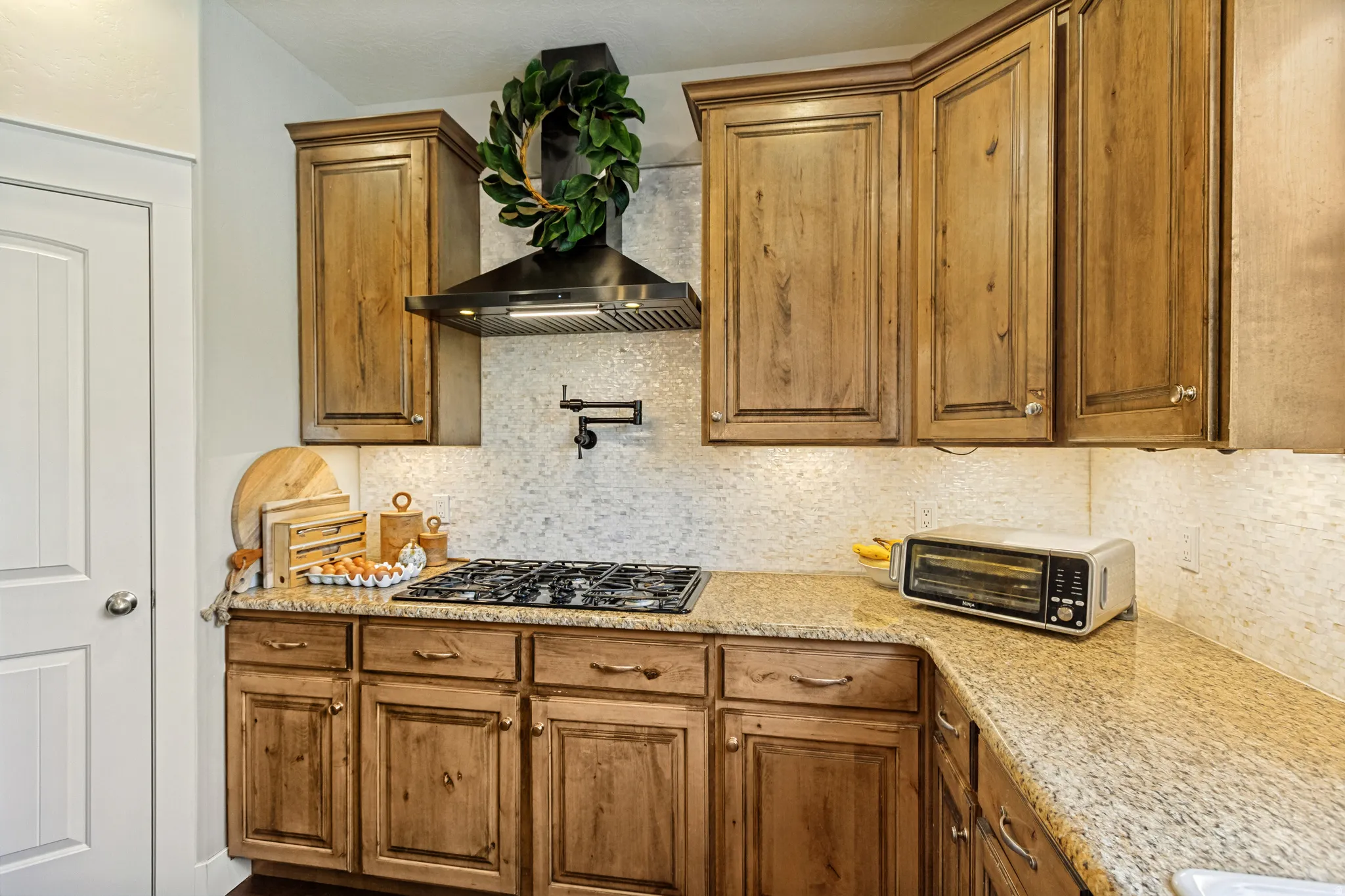 Wood cabinetry and granite countertops