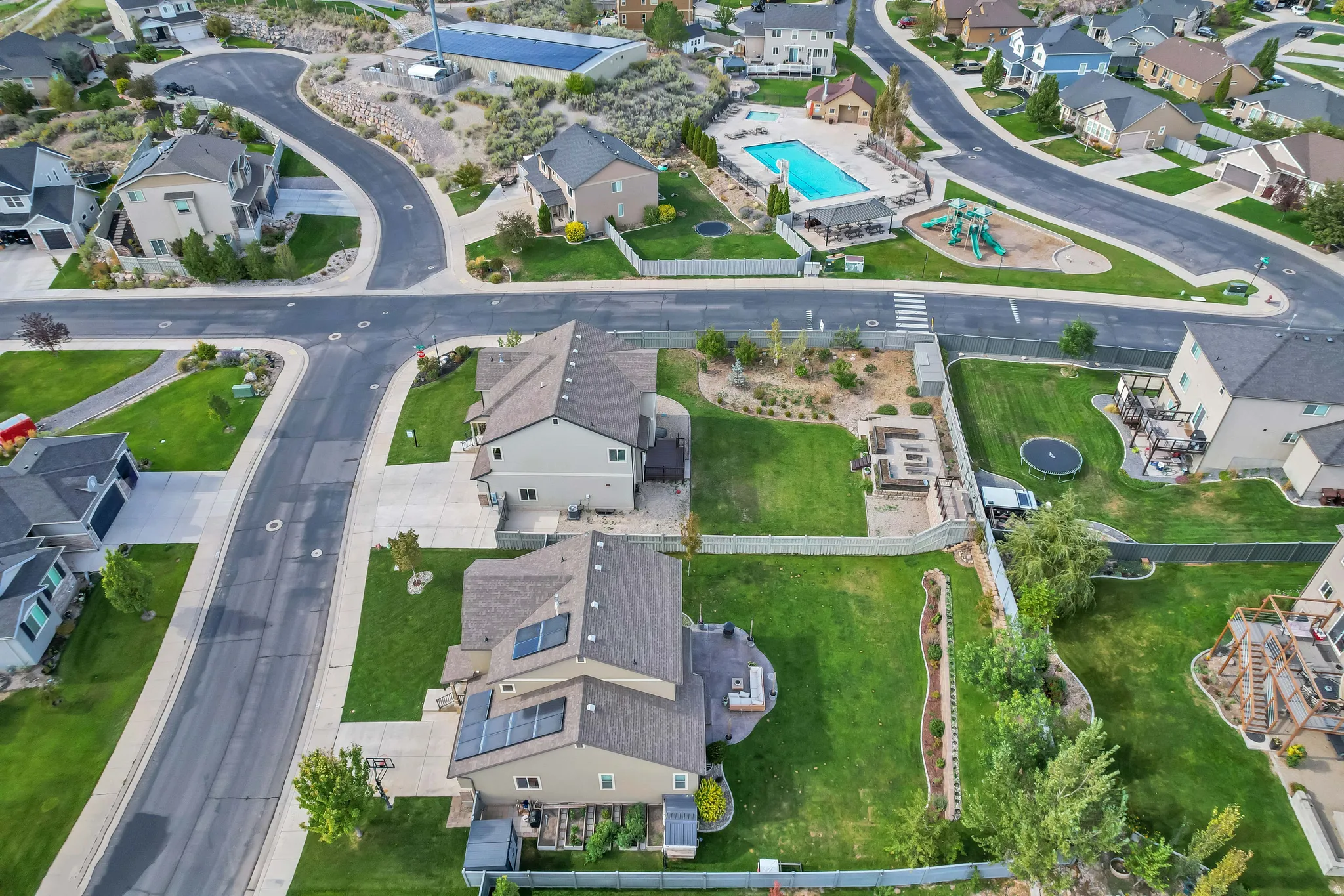 Community pool, playground, and paved roads