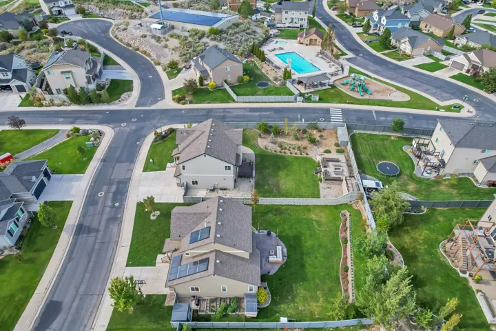 Community pool, playground, and paved roads