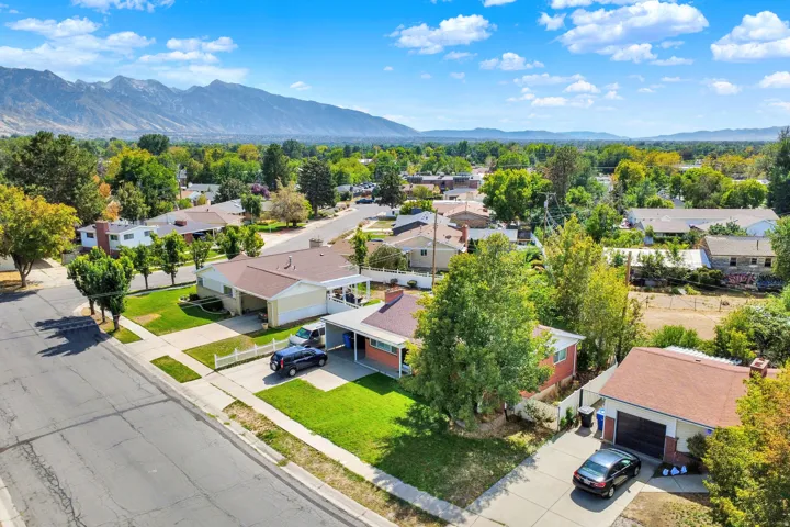 Neighborhood setting with established residential properties and mature trees
