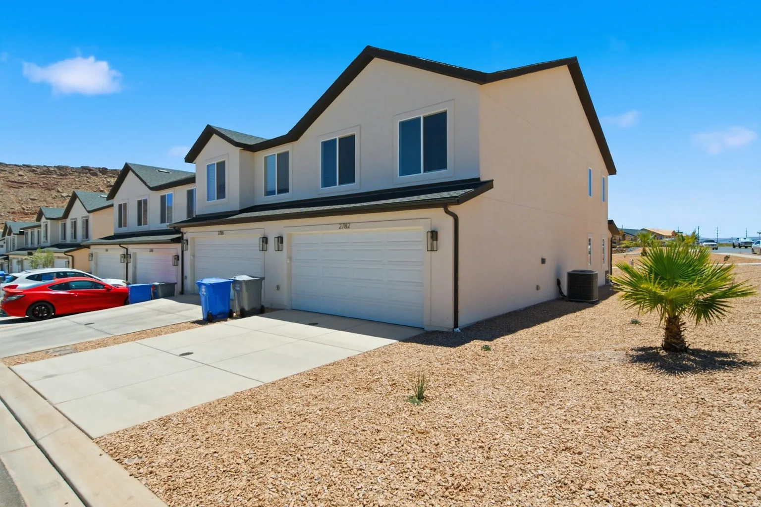 Stucco exterior with dark trim accents