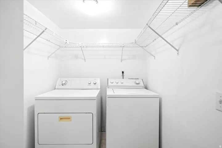 Integrated laundry appliances with overhead wire shelving