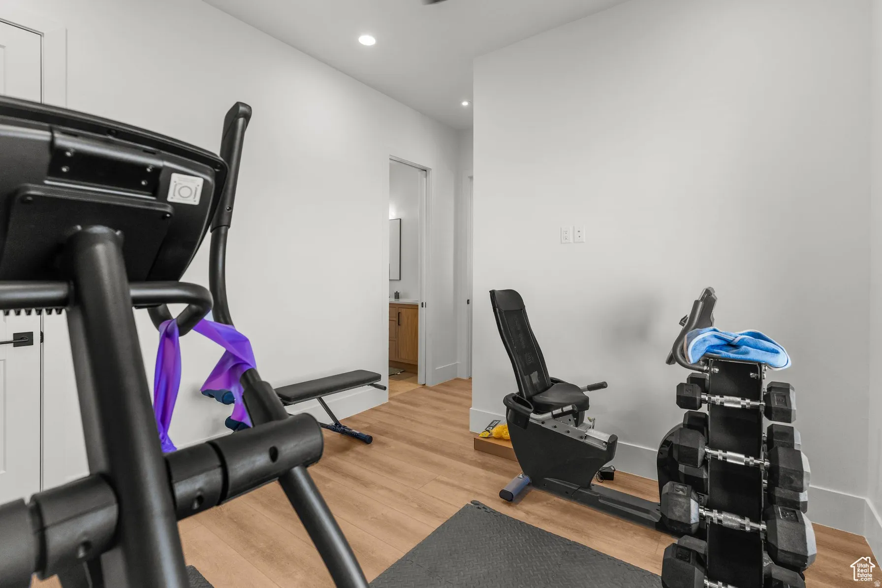 walls, and a white door with black hardware