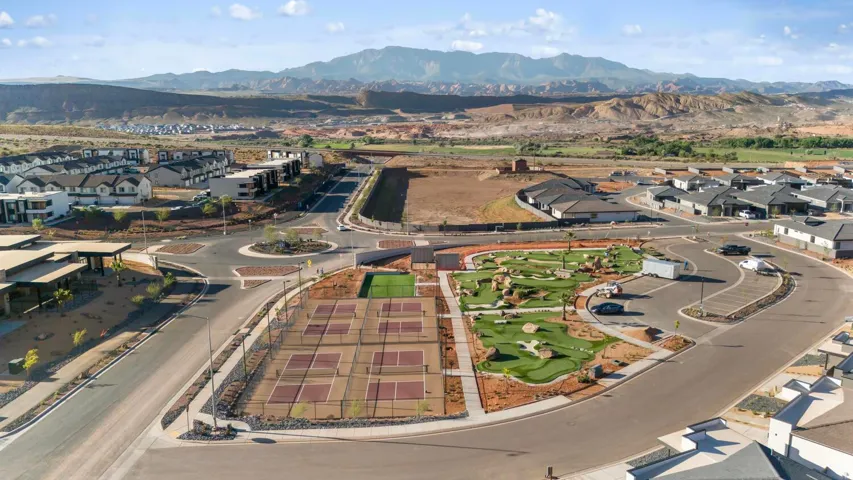 Community featuring multiple pickleball courts, a miniature golf course, and a central roundabout