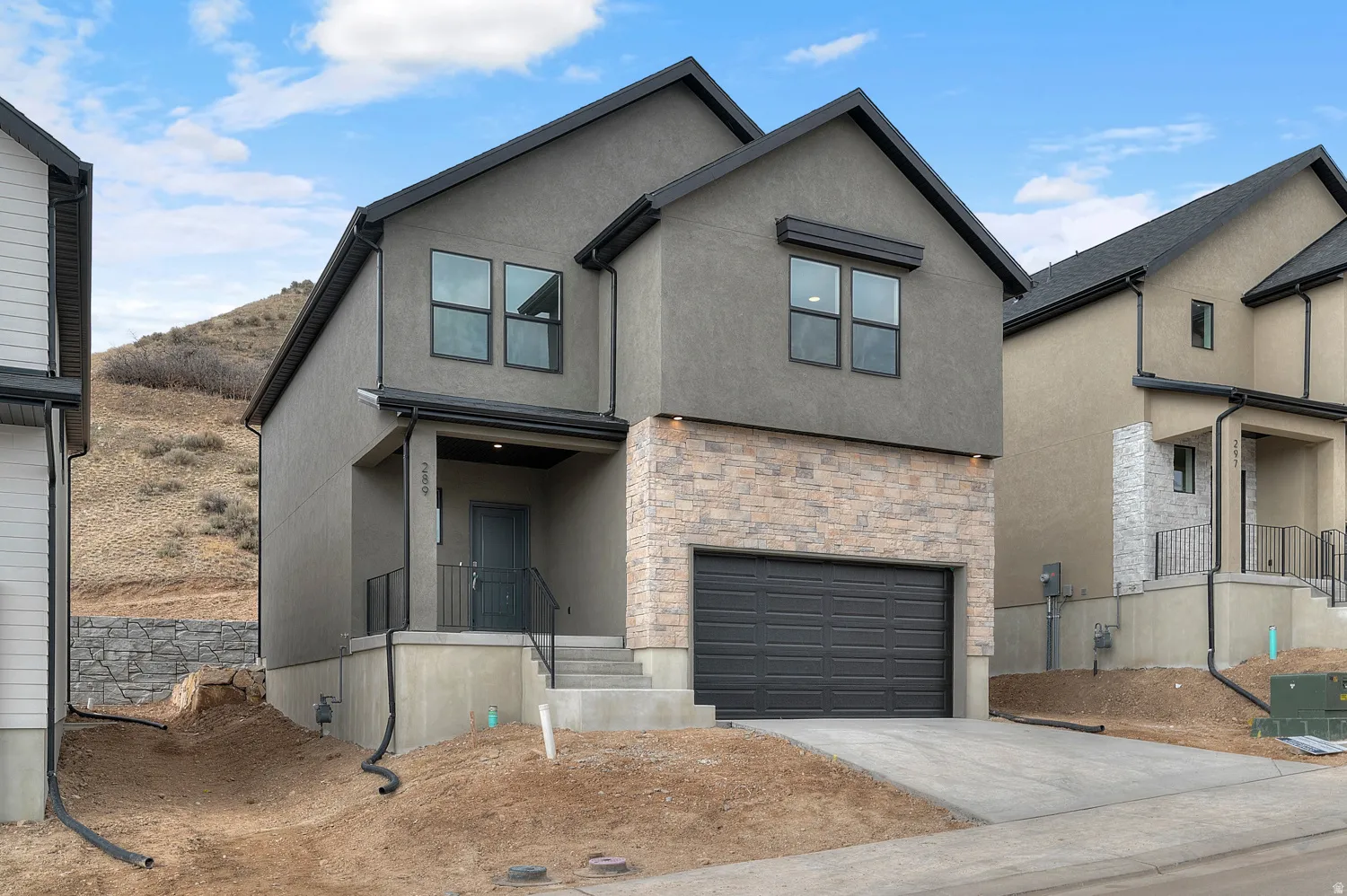 Contemporary exterior with textured stucco siding