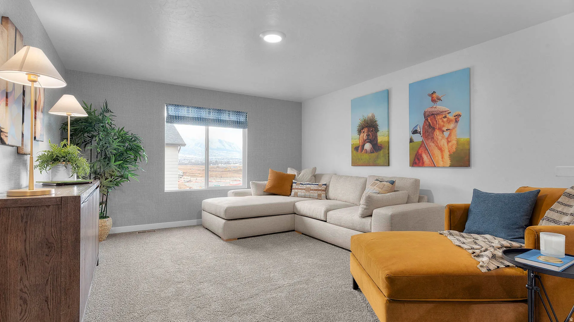Recessed lighting, light gray wall finishes, and carpeted flooring