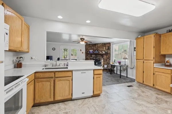 Kitchen featuring wood cabinetry.