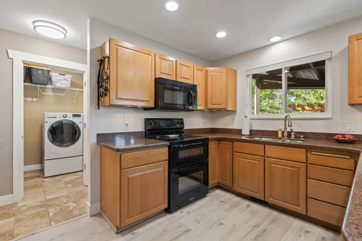 Hardwood Maple Cabinets  & Laundry off the Kitchen and Garage