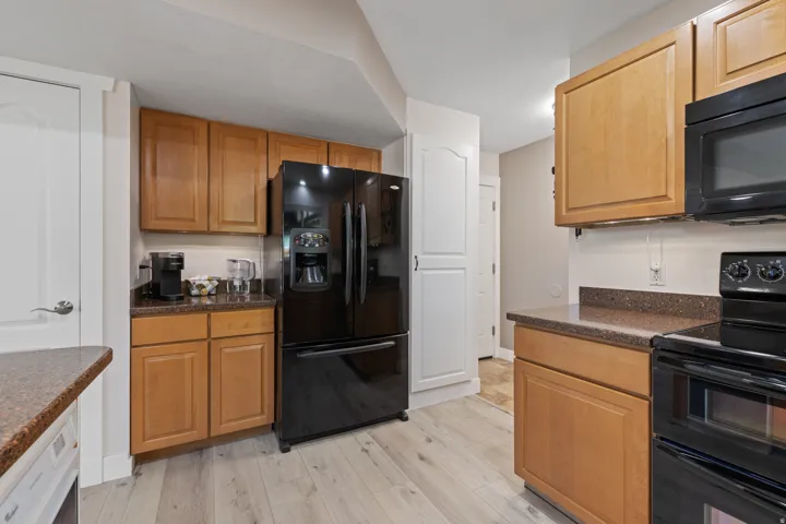 Refrigerator Included. All matching Black Appliances.