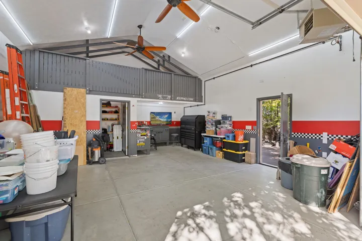 Detached Garage with Loft & Secured Storage Room.