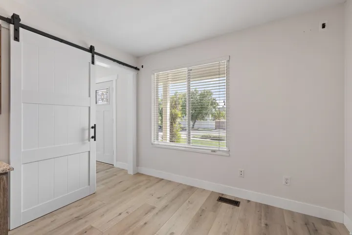 Well lit Main Level Office with Sliding Door