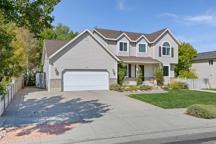 9 foot wide gate leads to a Huge Garage/Workshop in back