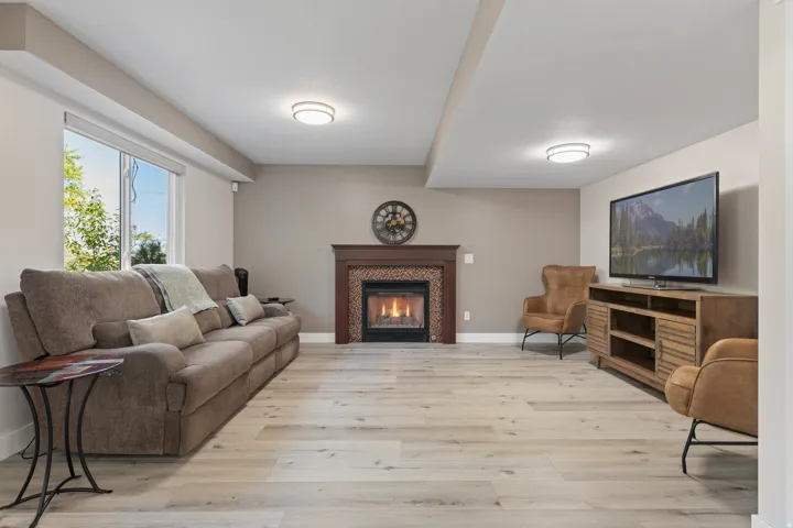 )pen Family Room with Gas Fireplace