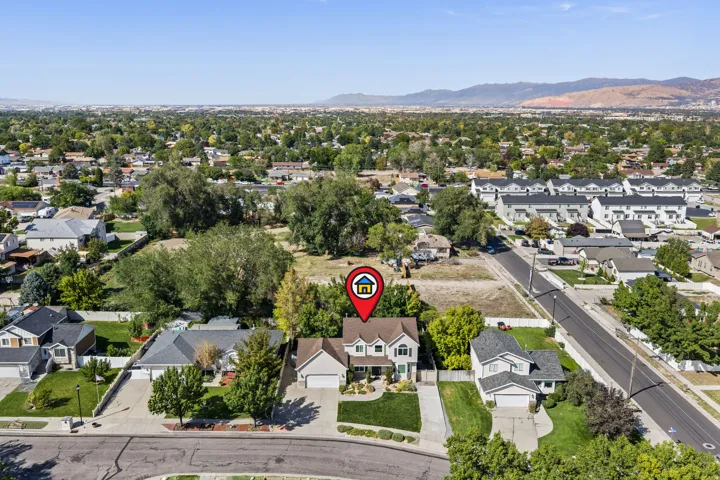 Aerial View of front of house and neighbors